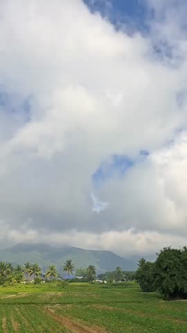 Clouds drift over the mountains in the morning