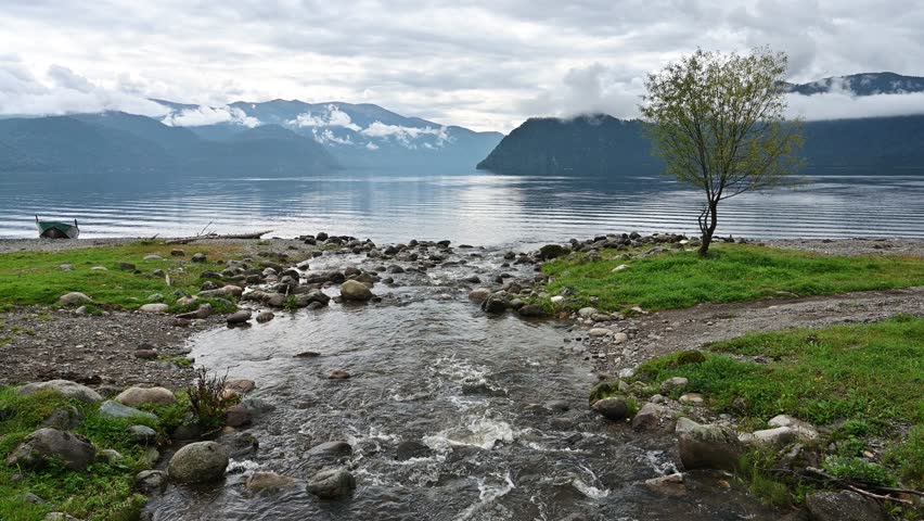 A stunning landscape with one of the many rivers flowing into Lake Teletskoye. Altai Republic, Russia
