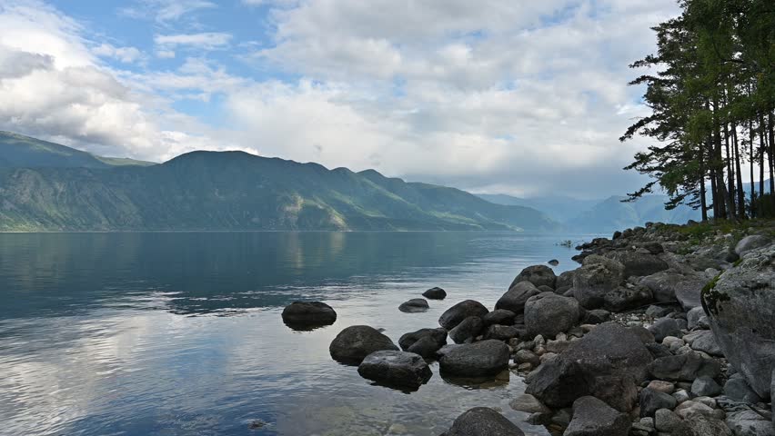 Stunning landscape of Lake Teletskoye in Altay, Russia. Beautiful summer nature landscape at during daytime
