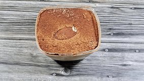 Tiramisu, an Italian dessert made of ladyfinger pastries (Savoiardi) dipped in coffee, layered with a whipped mixture of egg yolks, sugar, and mascarpone, and topped with cocoa powder - Powered by Shutterstock - Get 15% off with code: PIKWIZARD15
