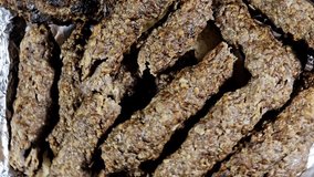 Kufta Middle Eastern Arabic cuisine traditional food beef Kofta, kebab and tarb kofta shish which is minced meat, Arabian oriental grilled barbecued meat food on Egyptian Aish pita bread - Powered by Shutterstock - Get 15% off with code: PIKWIZARD15