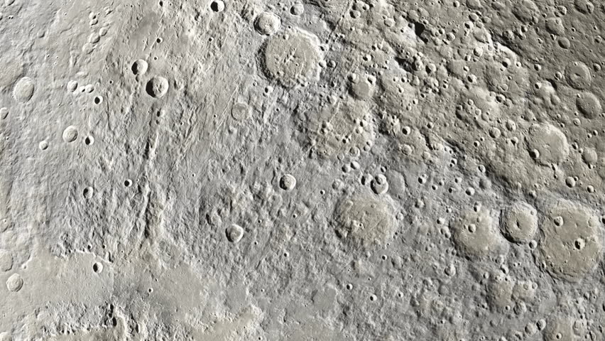 Surface of the Moon. The camera slowly moves over the surface of the moon simulating the flight of a spacecraft in near lunar orbit