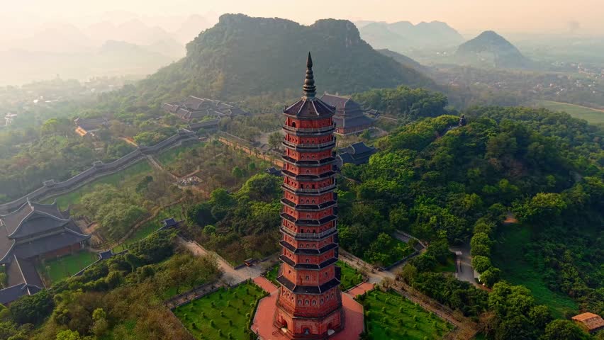 Aerial view of bai dinh pagoda and mountains at sunset in Ninh Binh, Vietnam.