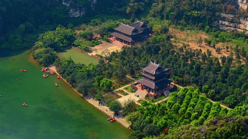 Aerial view of tranquil landscapes and temples in Ninh Binh, Vietnam.