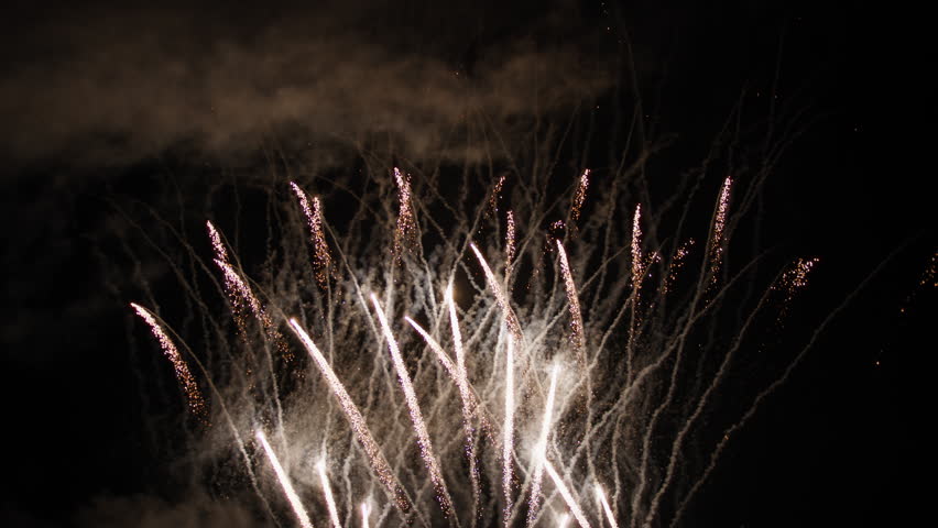 Fireworks explode at night in the dark sky for Indian Diwali celebration