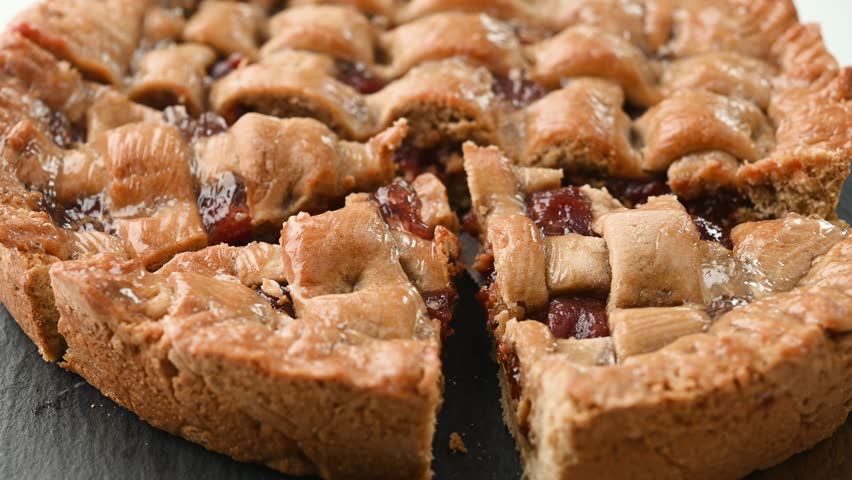  taking a piece traditional Pastafrola pie