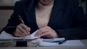 Businesswoman analyzing printed financial report with upward trend line graph showing annual performance growth and success in strategy. - Powered by Shutterstock - Get 15% off with code: PIKWIZARD15