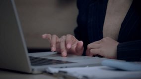 Businesswoman using laptop with futuristic line graph dashboard, analyzing financial performance and strategic data trends in modern office. - Powered by Shutterstock - Get 15% off with code: PIKWIZARD15