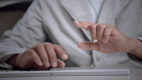 Professional using keyboard and digital interface to interact with global data analytics, bar charts, and futuristic dashboard visualization. - Powered by Shutterstock - Get 15% off with code: PIKWIZARD15