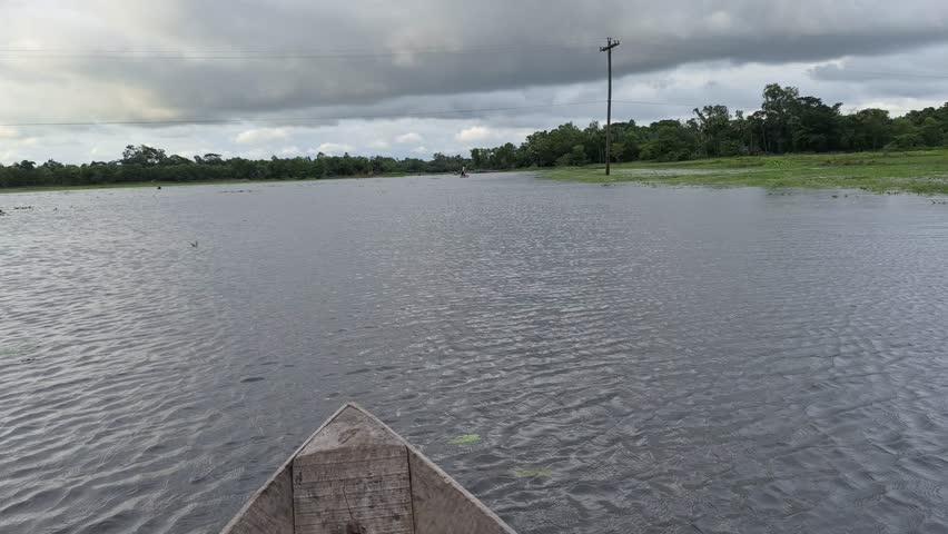 BEUTIFUL VILLAGE RIVER SEEN FROM BOATS 
