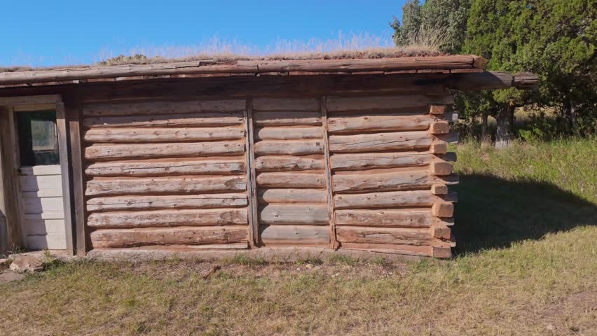 The historic buildings of the Ewing-Snell Ranch stand as a testament to the past against the beautiful backdrop of Bighorn Canyon