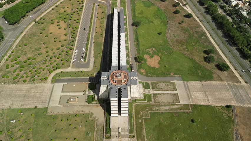 4K drone footage of Faro a Colón, Santo Domingo — monumental Columbus Lighthouse with city view. Perfect for tourism and history projects