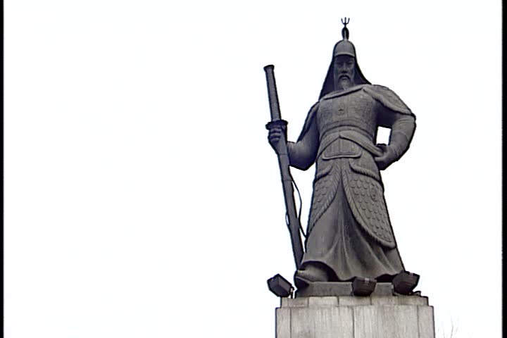 SEOUL - FEBRUARY 26, 1997: Jung-gu section of Seoul; WS bronze statue of Admiral Yi Sun Sin on Sejong Avenue. MCU head and chest of statue. 