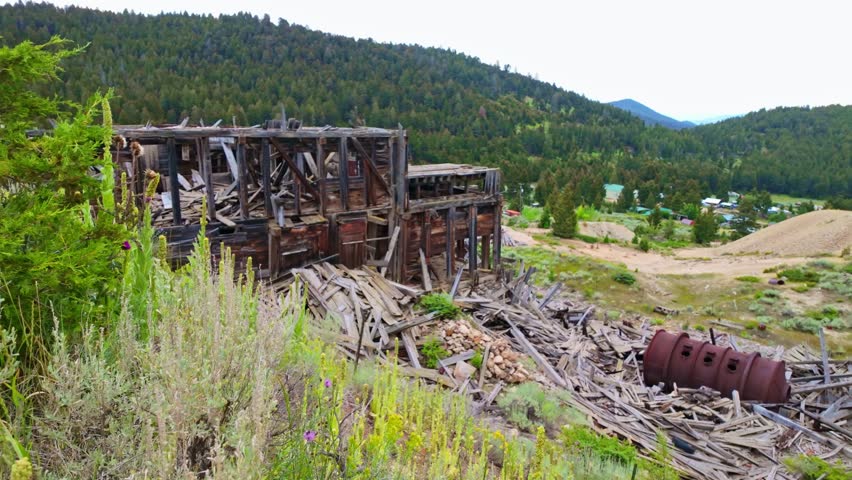Old abandoned mine buildings stand as a testament to the past at the historic Elkhorn ghost town in Montana