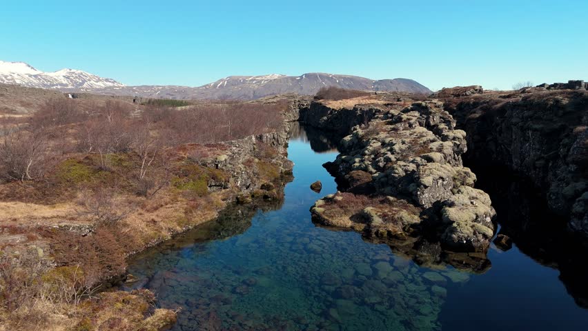 Aerial view of the beautiful Oxararfoss waterfall between tectonic plates, inside the Thingvellir National Park, Iceland