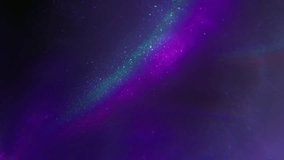 Fluorescent beam. Shiny ink flow. Defocused purple green blue color gleam sparkling neon rainbow particles on abstract dark black light background. - Powered by Shutterstock - Get 15% off with code: PIKWIZARD15