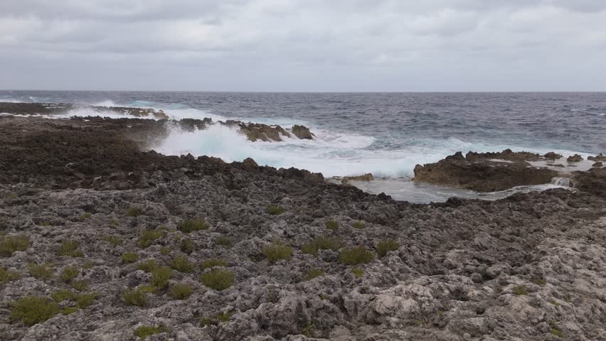 Powerful Wave Hitting Rocks In Jamaica