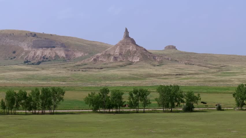 Scenic view of Chimney Rock with vast plains and peaceful nature