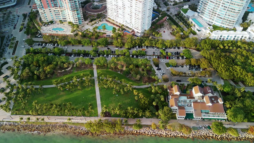 Drone view of high skyscrapers and green parks on the Miami beach near harbor. USA FL Miami March 31 2025
