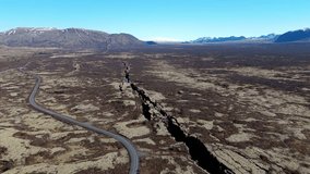 Silfra Fault Aerial wide angle view of the amazing break between tectonic plates in the Thingvellir National Park, Iceland - Powered by Shutterstock - Get 15% off with code: PIKWIZARD15