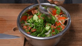 Tomato and cucumber salad mixed with sour cream. Healthy homemade food close-up. - Powered by Shutterstock - Get 15% off with code: PIKWIZARD15