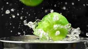 Slow Motion Green Apple Splashing into Water - Powered by Shutterstock - Get 15% off with code: PIKWIZARD15