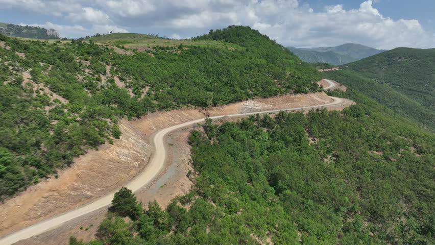Aerial Drone View of Isolated Albanian Mountain Road and Hillside