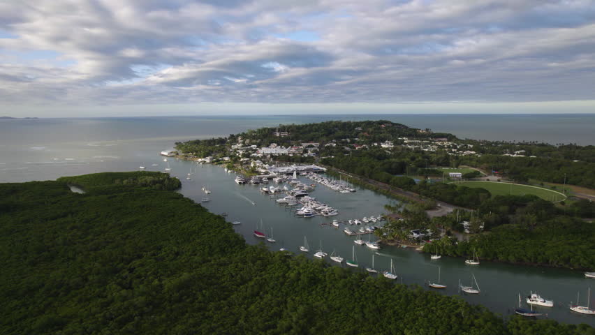 Establishing drone shot of the Port Douglas town, day in Queensland, Australia