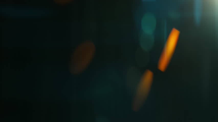Real Shooted Cinematic Lens Flare Overlay on Black Background at 1000fps Slow Motion.
