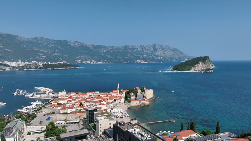 Montenegro Summer Destination with Beach, Boats, and Mountains
