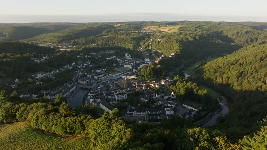 Scenic Bouillon town and medieval fortress in sharp bend of Semois River, aerial