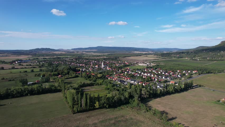 Aerial view of Gyulakeszi village and Csobánc Hill, Balaton Uplands, Hungary.