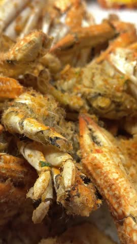 Big shrimps fry on a frying pan.