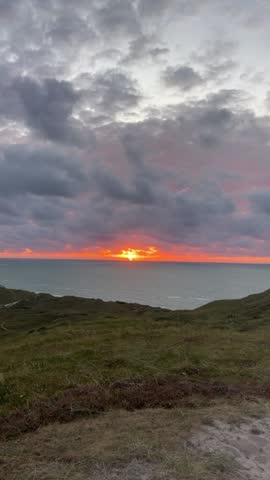 Bulbjerg natural cliffs at the North Sea coast in Denmark. Denmark, Jutland, Bulbjerg. Dune landscape. Bulbjerg Vogelfelsen. Scenic view of sea against sky. Bird cliff. Beautiful destination. North 
