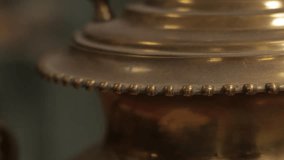 a close-up the intricate details of a vintage brass lamp, highlighting its polished surface and ornate design, evoking a sense of classic craftsmanship - Powered by Shutterstock - Get 15% off with code: PIKWIZARD15