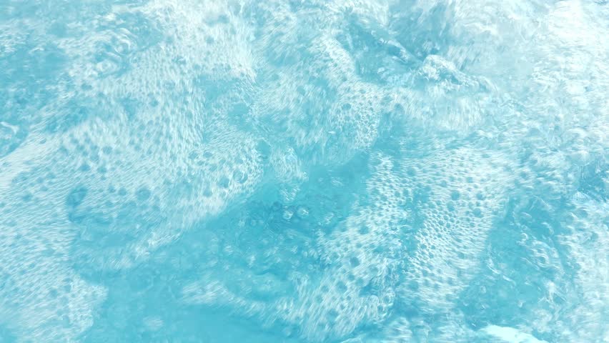 Boiling Blue Water in Spa — Bubbling Turbulent Surface, Aqua Liquid Texture, Relaxation and Wellness Abstract Background
