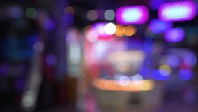 Defocused view of amusement Arcade game center. Toy crane game vending machine
 - Powered by Shutterstock - Get 15% off with code: PIKWIZARD15