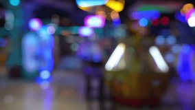 Defocused view of amusement Arcade game center. Toy crane game vending machine
 - Powered by Shutterstock - Get 15% off with code: PIKWIZARD15