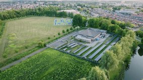 Small data center with solar panels for sustainable power usage, green energy, aerial approach - Powered by Shutterstock - Get 15% off with code: PIKWIZARD15