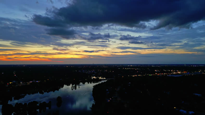 A Beautiful and Tranquil Scene Of the Evening Twilight Sky Over a River In Tampa City, Florida - Drone Shot Tracking to the Left