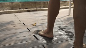 A man jumping into the swimming pool, summer activity, people enjoy holiday weekend, playing water - Powered by Shutterstock - Get 15% off with code: PIKWIZARD15