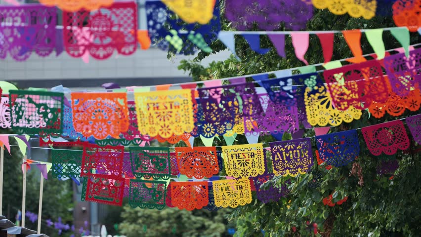 Colorful Papel Picado Banners Decorating a Latin American Fiesta