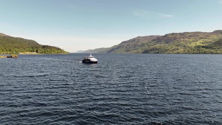 Drone footage of cruise boat on Loch Ness, Scotland, United Kingdom