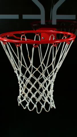 Super slow motion of basketball ball hitting the basket . Filmed on high speed cinema camera , 1000 fps
