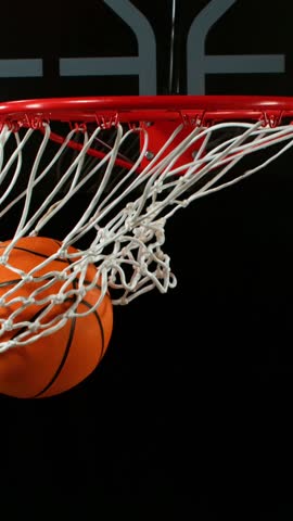 Super slow motion of basketball ball hitting the basket . Filmed on high speed cinema camera , 1000 fps
