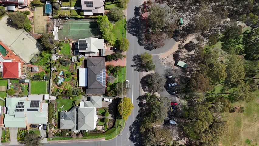 Magill and Auldana, Adelaide, South Australia: 4K Aerial Drone Footage of Residential Suburbs, Low Density Houses with Solar Panels, Gardens, Parks with Plum Blossoms and Adelaide Hills in Spring