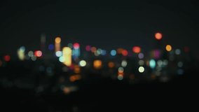 Blurred city lights at scenic evening with skies and Los Angeles downtown in bokeh effect. Defocused night street at dusk. Cityscape with skyscrapers night out of focus. town night scene. buildings - Powered by Shutterstock - Get 15% off with code: PIKWIZARD15