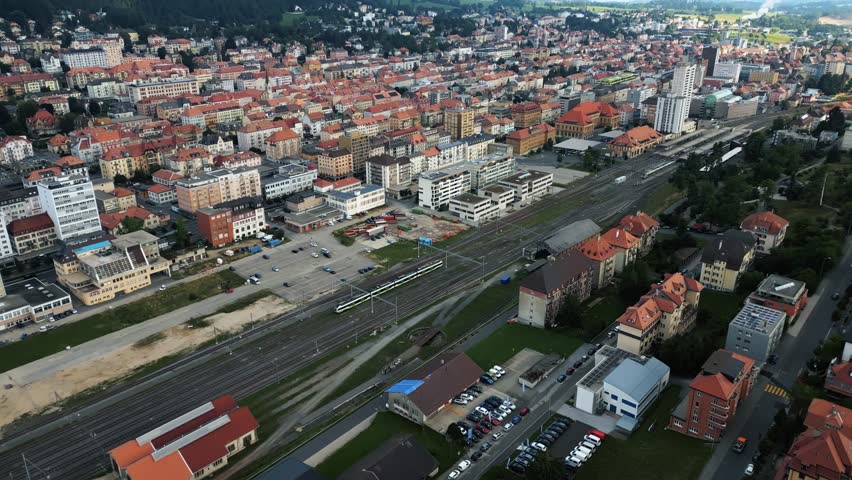 Aerial view of the train station with modern buildings, and historic architecture creating a contrast in La Chaux-de-Fonds, Neuchâtel, Switzerland.