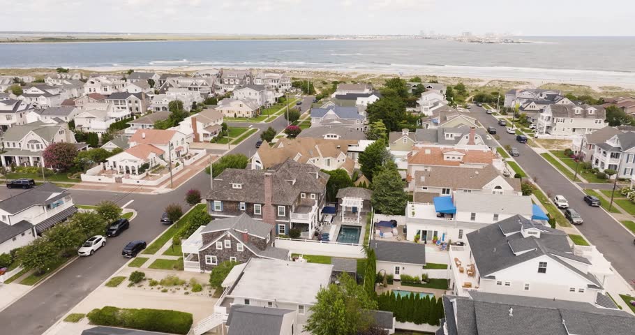 Aerial view of Ocean City New Jersey vacation rental homes with Atlantic City in the distance