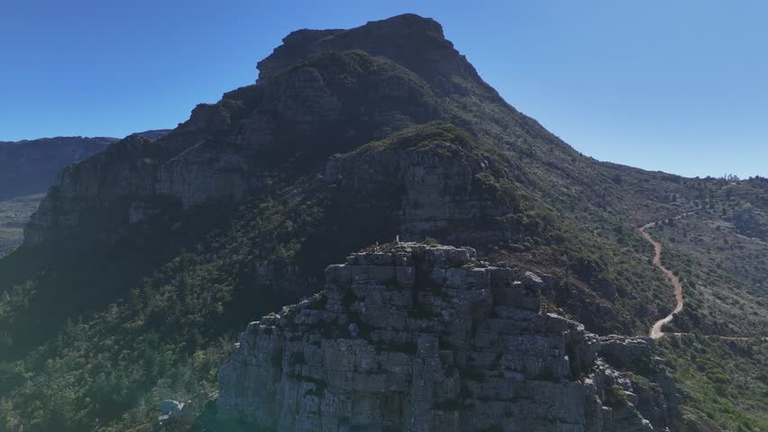 group of hikers standing on top of Devil